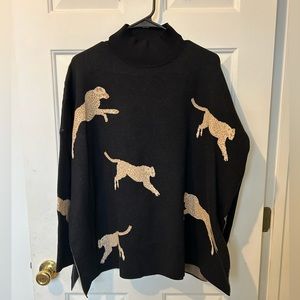 ENTRO brand. Size small. Black with leopards